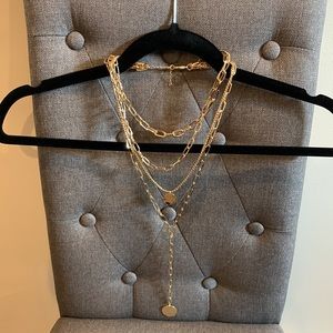 Express long gold toned necklace